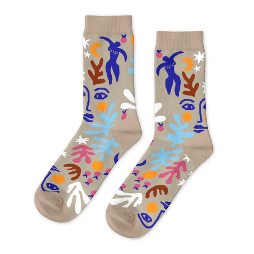 Tan crew socks featuring cut-paper figures botanical shapes and bold colors in blue pink orange and brown by Yellow Owl Workshop